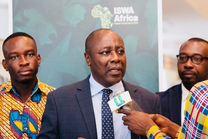 Ernest Kusi (inset) speaking at the programme