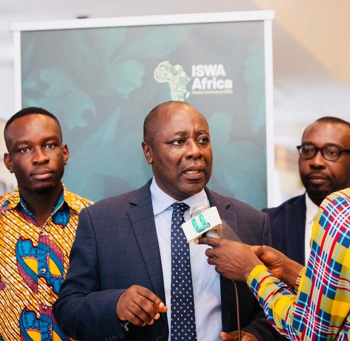 Ernest Kusi (inset) speaking at the programme