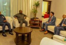 • President Mahama (second from left) and Mr Samuel Okudzeto Ablakwa (left) in a discussion with their Singaporean counterparts