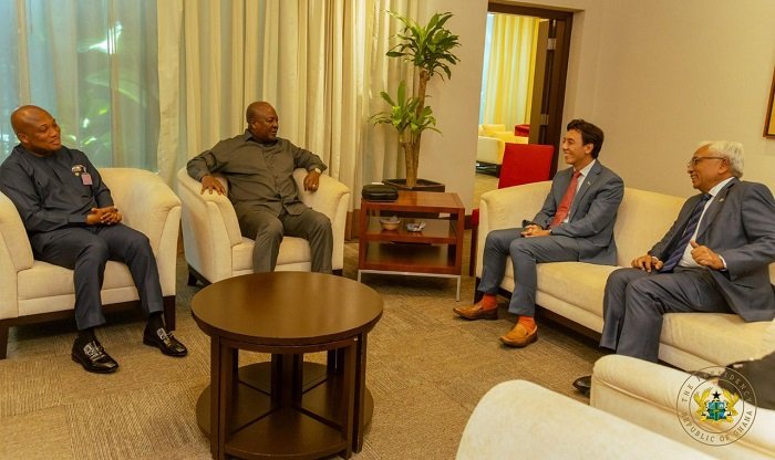 • President Mahama (second from left) and Mr Samuel Okudzeto Ablakwa (left) in a discussion with their Singaporean counterparts