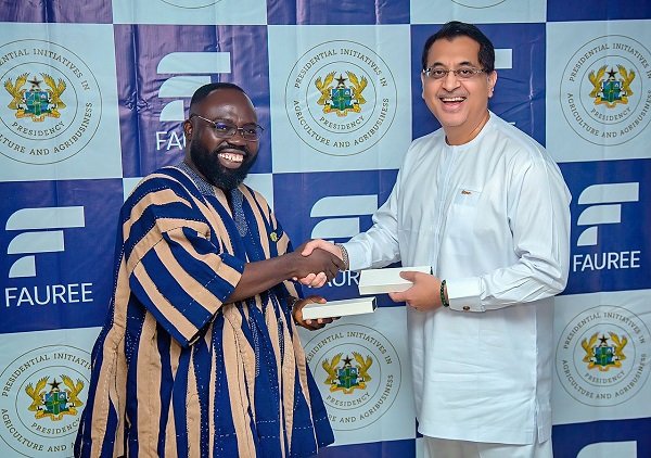 • Dr Peter Boamah Otokunor (left) and Mr. Azhar Tasadduq after signing the MoU