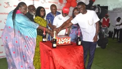 • Dr Lartey (third from left) being assisted by Mr Nkaw (third from right) and other dignitaries to cut the anniversary cake Photo: Victor A. Buxton