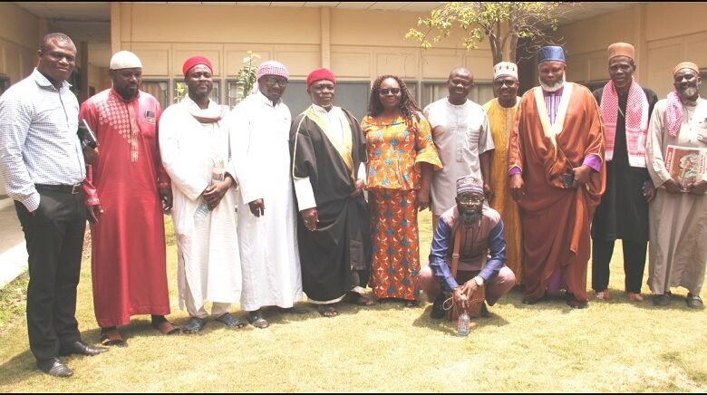 Alhaji Salifu Abdul-Rahaman (fifth from right) Mrs Georgina Naa-Maku Quaittoo (middle) with Imam Alhaji Saeed Abdulai (third from right), Andrew Nortey (left), Ag News Editor-Spectator and other Imams Photo: Elizabeth Okai