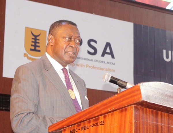 • Prof. Agyeman Badu Akosa (inset) Chairman, Medical and Dental Council administering an oath to the newly qualified physician assistants and certified registered anaesthetists