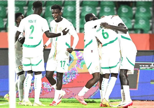 • Senegalese players celebrating the only goal of the game