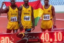 • Sprinters Solomon Diafo and Ansah Sarfo (middle) with a team member