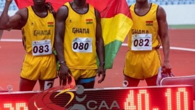 • Sprinters Solomon Diafo and Ansah Sarfo (middle) with a team member