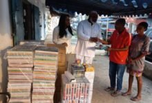 • Nii Abbey (second left) presenting the materials to Ataa Lartey