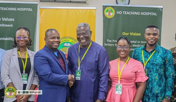 • Dr Hintermann K.K. Mbroh (second from left) exchanging greetings with Mr Issaka Sidi at the meeting