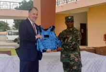 • Major General Lawrence Kwaku Gbetanu (right) receiving the items from Mr Rolf Olson