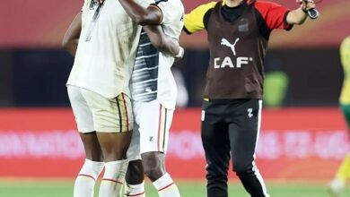 • Uganda players and an official celebrating their quaification