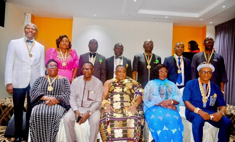 • Dr Dee Otibu-Asare (seated second from left) with other dignitaries and honorees at the event
