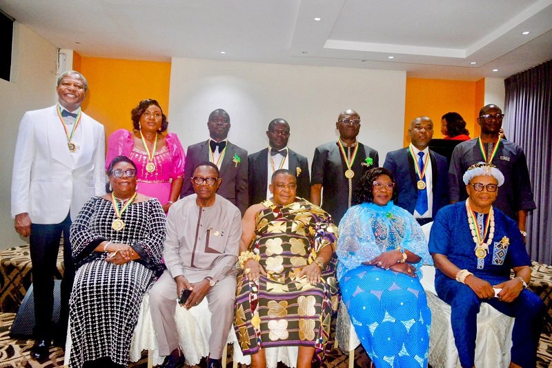• Dr Dee Otibu-Asare (seated second from left) with other dignitaries and honorees at the event