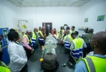 • The delegation being briefed at the tour