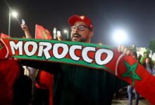 • A Morocco fan celebrates after a match