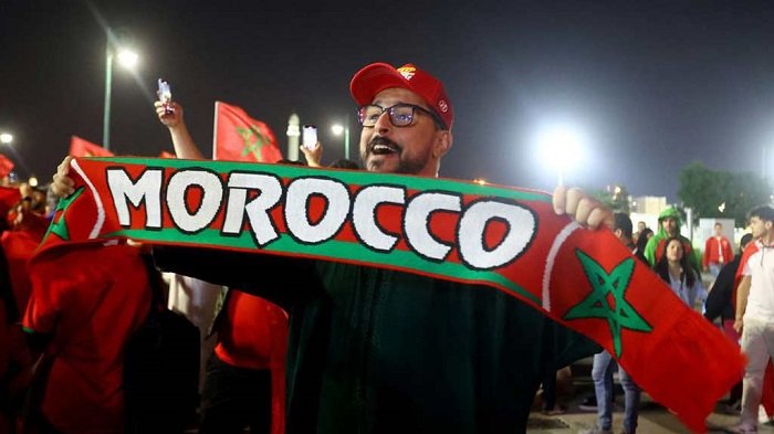 • A Morocco fan celebrates after a match