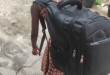 • A girl with a heavy school bag