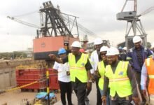 Alhaji Osman Sulemana (hand stretched), CEO Tema Shipyard, briefing Ms Dorcas Affo-Toffey (middle) during her visit to the Tema Shipyard comapany Photo: Ebo Gorman