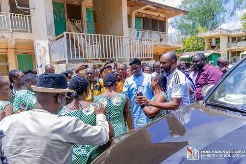 • Mr Haruna Iddrisu interacting with a section of students at Zebila SHTS