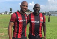• Didier Drogba (left) with George Weah