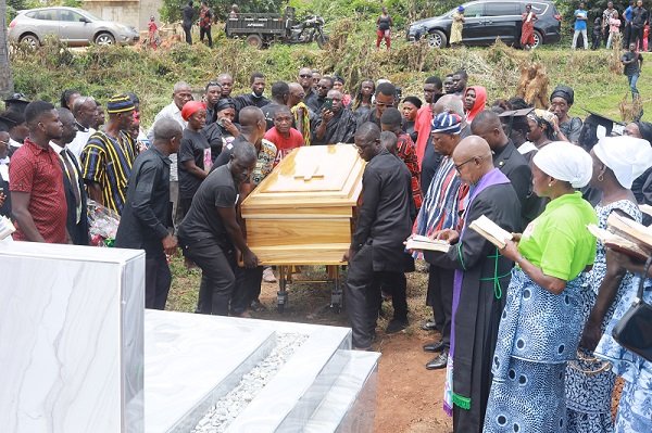 The casket containing the remains of the late Ebo Quansah being carried for burial