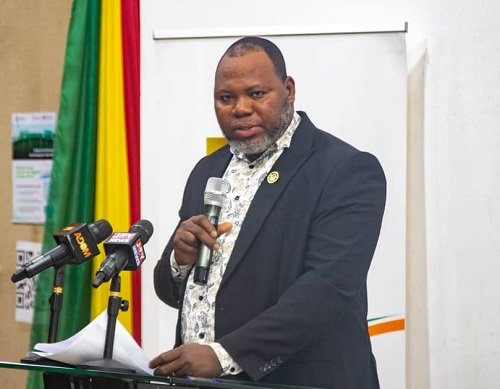 • Dr Jacob Paarechuga (inset), speaking at the lecture