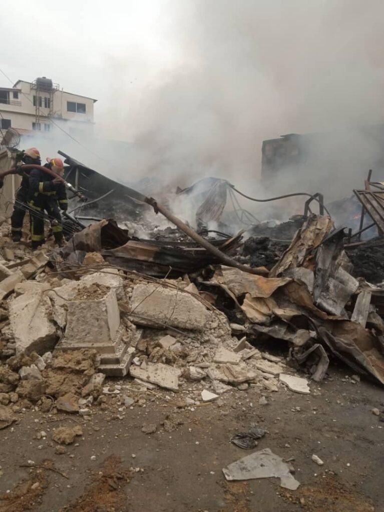 • Fire fighters trying to douse the fire