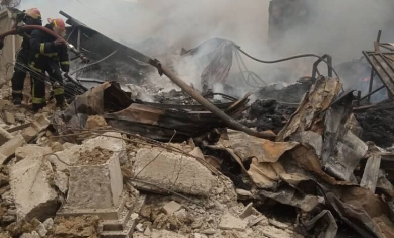 • Fire fighters trying to douse the fire