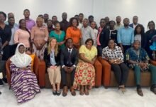 Mr Owusu seated (third right)and Mrs Larbi also seated(second rights) with stakeholders