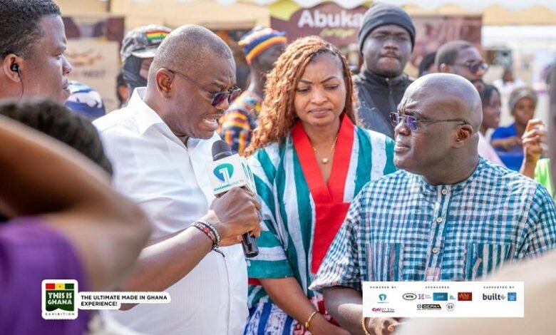 • Mr Debrah (right) being taken round the stands
