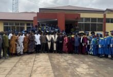 The graduands with dignitaries at the graduation ceremony