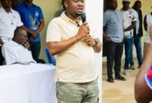 • Mr Abdul Halim Tikumah, aid to the MP, addressing the students at the disbursement ceremony