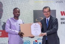 • Mr Yoshimoto (right) presenting an award to one of the MSMEs