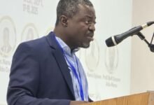 • Prof. Kofi Sarpong Adu-Manu (inset) speaking at the programme