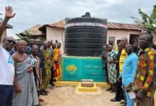 • Staff of aYo and the community members at the facility after the inauguration