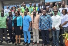 Mr Kow Eduakwa Sam (third from right, front row) with participants after the programme
