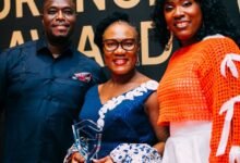 • Mrs Boampong (middle) displaying her award