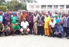 • Mr Opoku with the peasant farmers