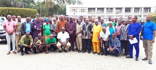 • Mr Opoku with the peasant farmers