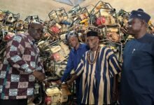 • Mr Opoku (left) presenting the machines to some Regional Ministers