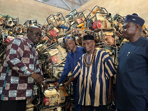• Mr Opoku (left) presenting the machines to some Regional Ministers