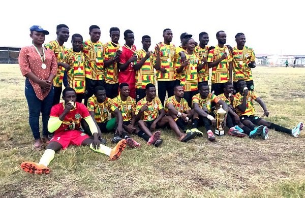 • Players of the New Juaben DFC display their medals after their coronation as champions