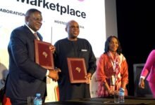 Prof Oramah(middle) in a handshake with one of the governors from Nigeria