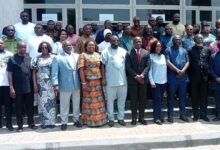 • Mr Ahmed Ibrahim (middle) with the MMDCE's after the meeting