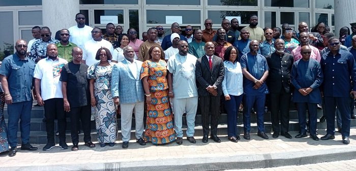 • Mr Ahmed Ibrahim (middle) with the MMDCE's after the meeting
