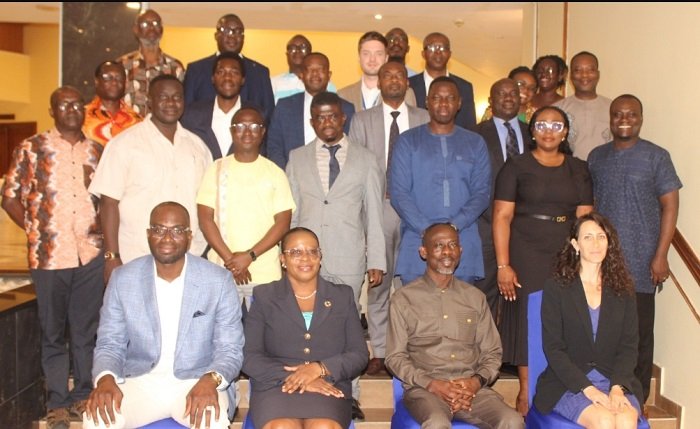 • Dr Audrey Smock Amoah (seated second from left), Dr Owusu Kagya (seated second from right) and Dr Tiah Abdul-Kabiru Mahama (seated left) with the participants after the opening ceremony Photo: Ebo Gorman