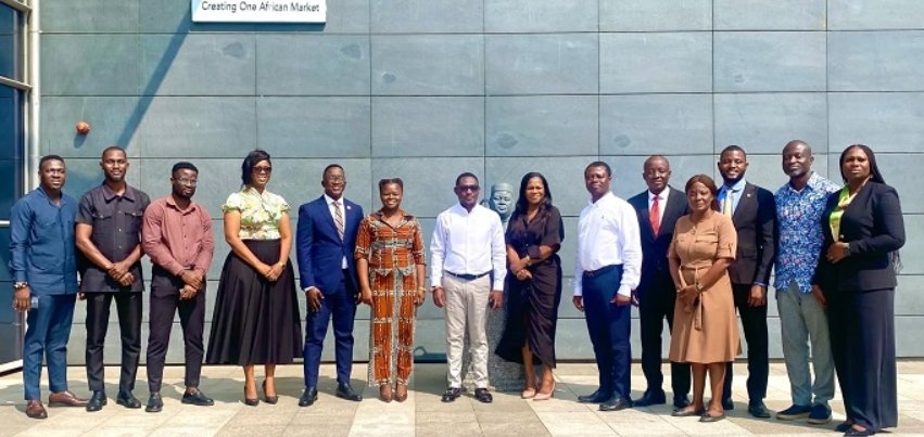 Mr Ackom (seventh from left) with other participants in the meeting