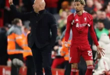 Slot (left) with Ekitike