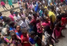 • Some of the children waiting to collect their parcels