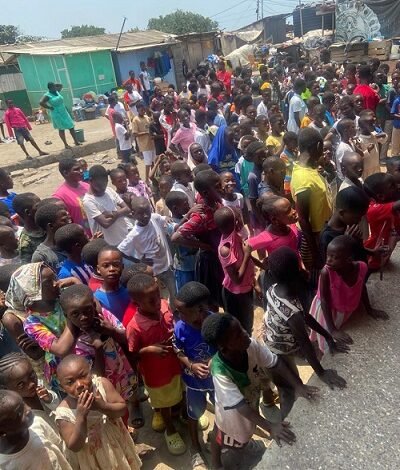 • Some of the children waiting to collect their parcels